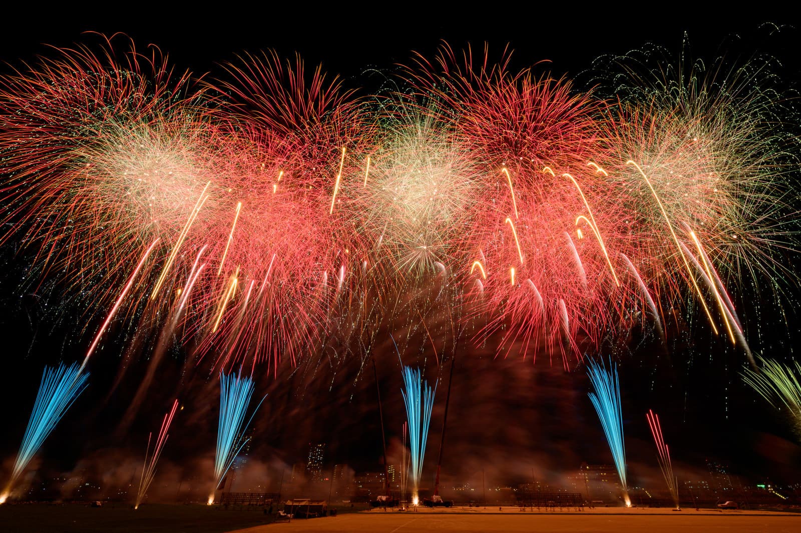 Starmine fireworks bursting over the night sky at the Edogawa Fireworks Festival, Tokyo
